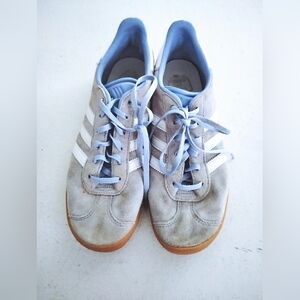 Adidas Gray Sneakers with White Stripes and Blue Highlights